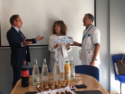  <a style='color: #fff;' href='/uploaded/photo/remise-de-cheque-59aed989e521a.jpg'>(Télécharger)</a>